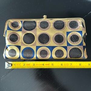 Hobo clutch. Adorable black, gold, and navy circles